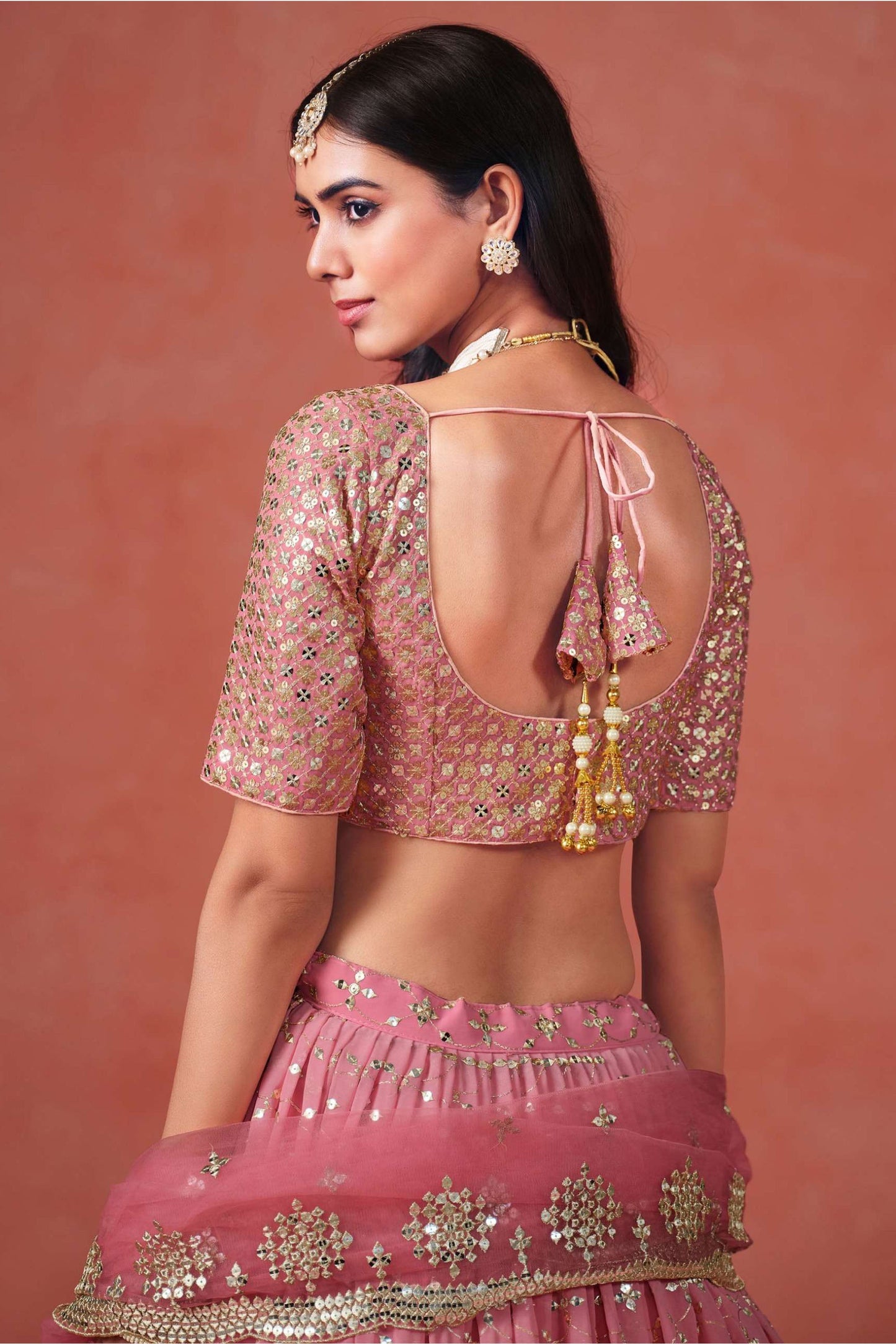 Designer Roka Georgette Lehenga Choli Set With Embroidered Details And Net Dupatta