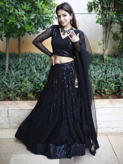 Black luxury bridal lehenga with net dupatta for wedding reception.