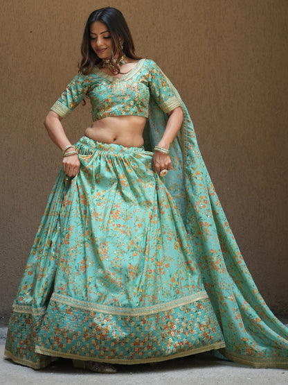 Cyan floral print designer lehenga for wedding reception.