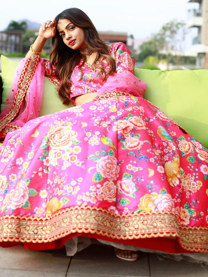 Pink floral print Indian designer lehenga for wedding shoot.
