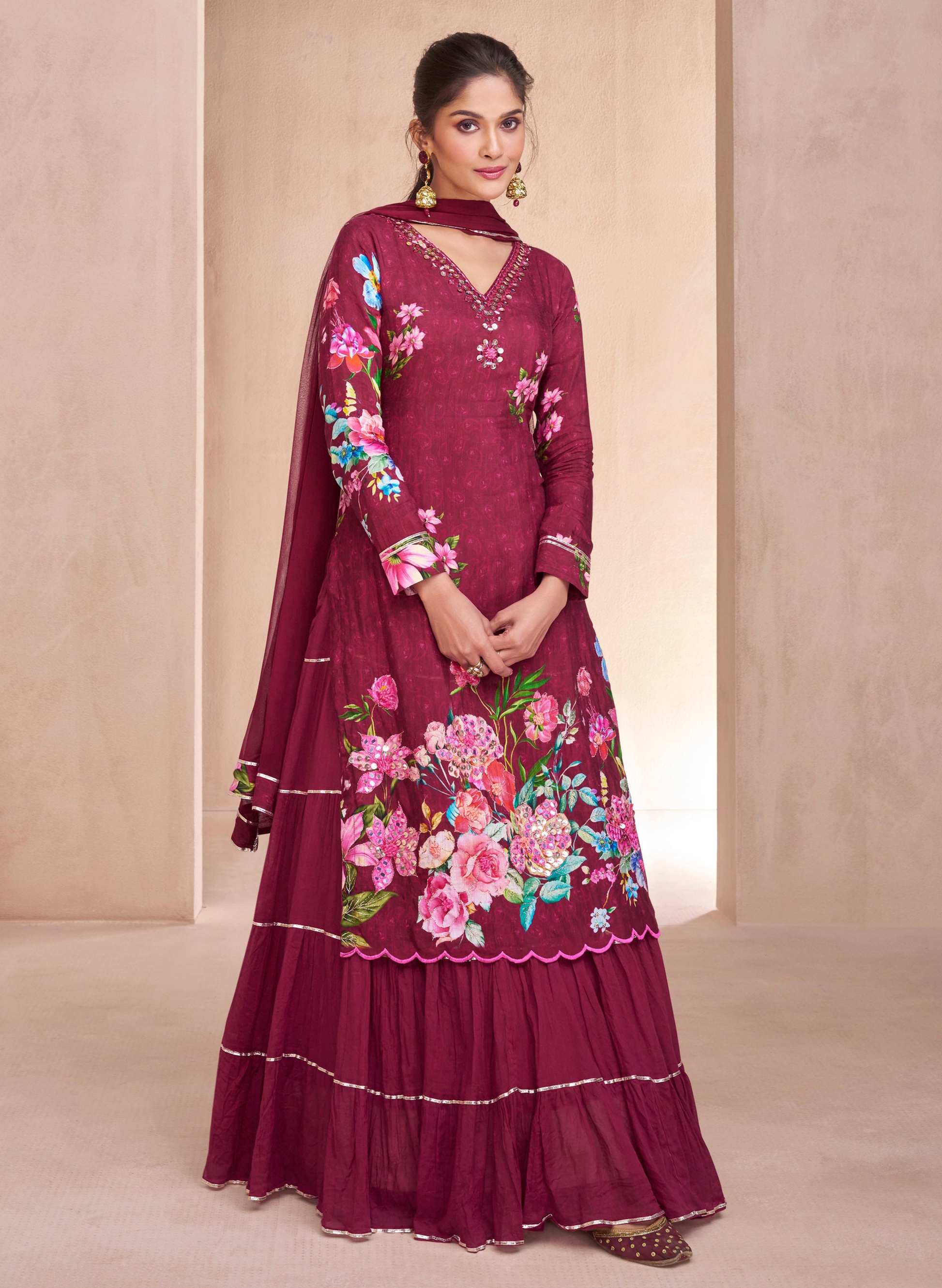 Wine Lehenga speaks of depth and refined glamour – a stunning choice for evening functions, sangeet, or regal festivities. 