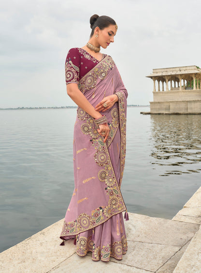 Lavender Gadwal silk saree with magenta blouse and embroidery.