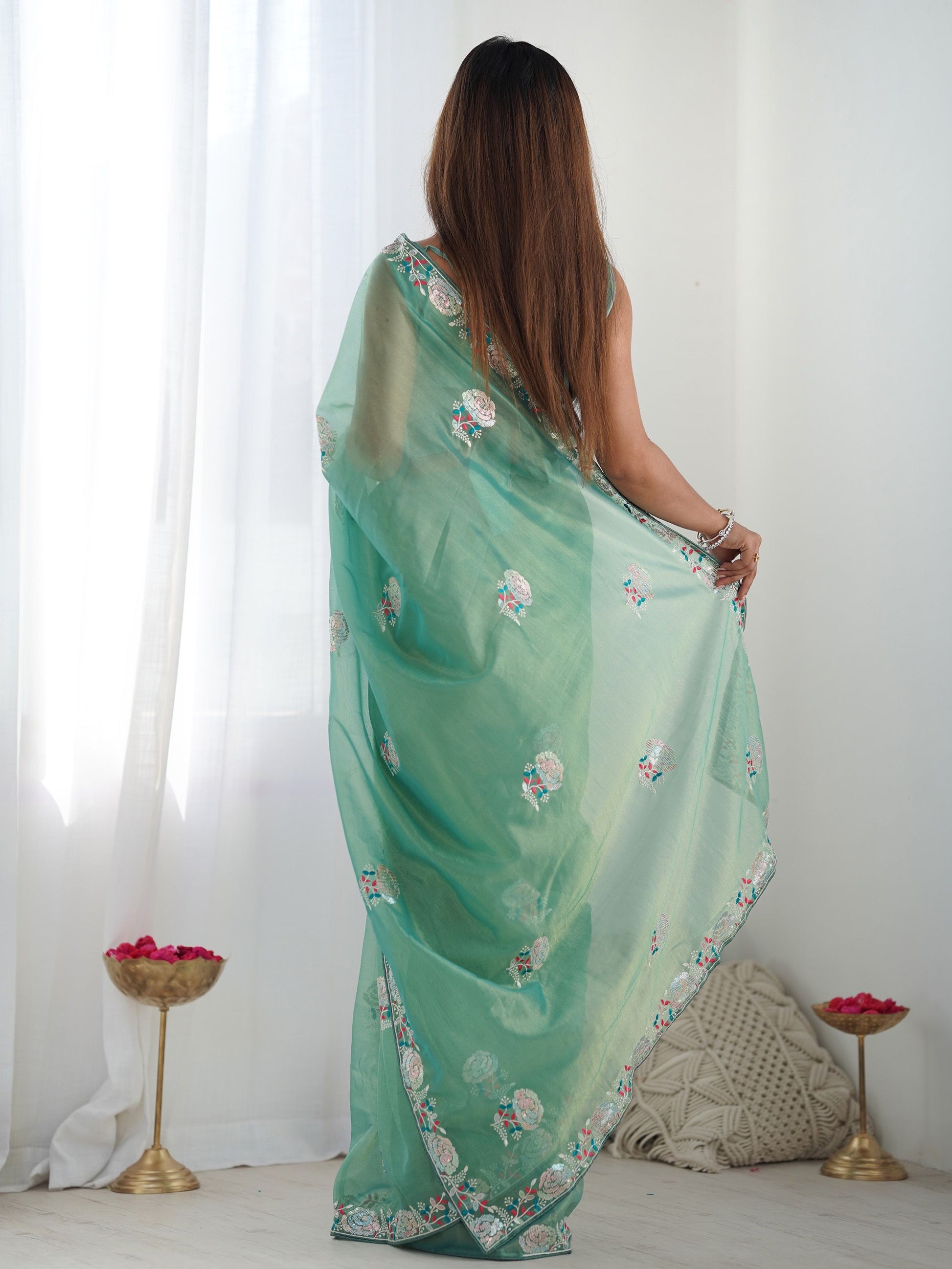 Pastel Green Saree symbolizes freshness and festivity – great for Mehndi or family gatherings. 