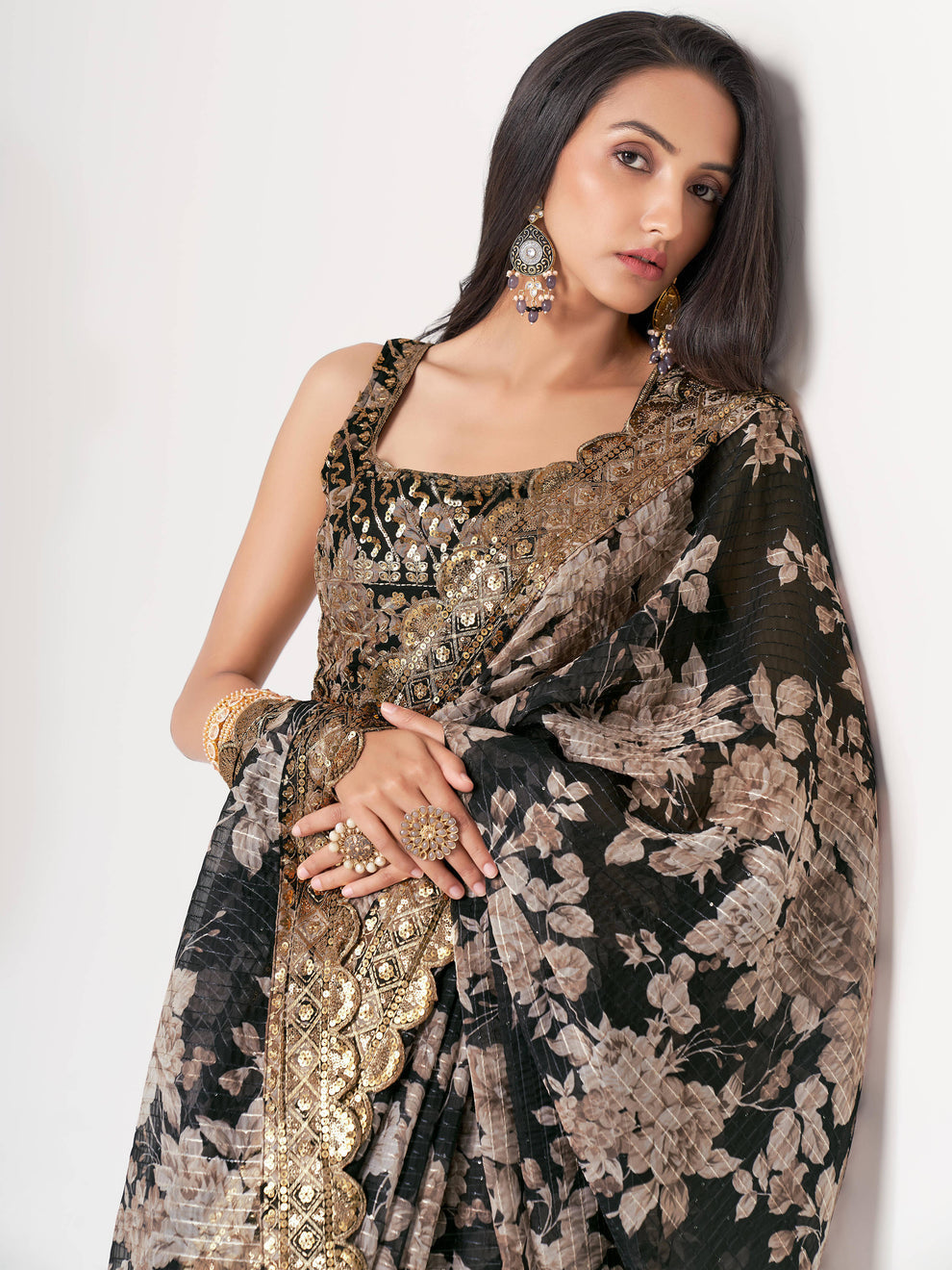 Black Saree defines elegance and confidence – perfect for evening parties and receptions. 