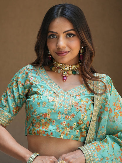 Cyan floral print designer lehenga for wedding reception.
