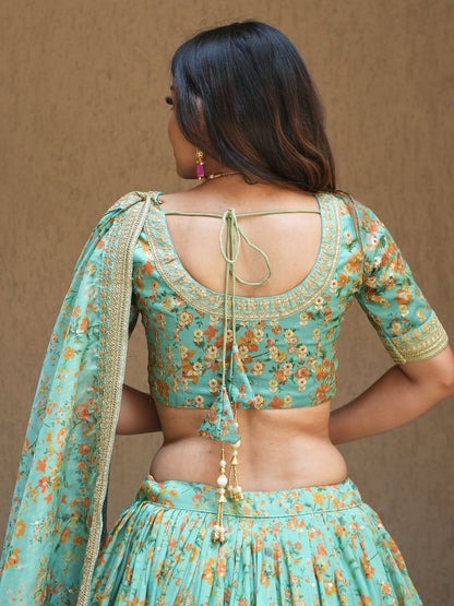 Cyan floral print designer lehenga for wedding reception.