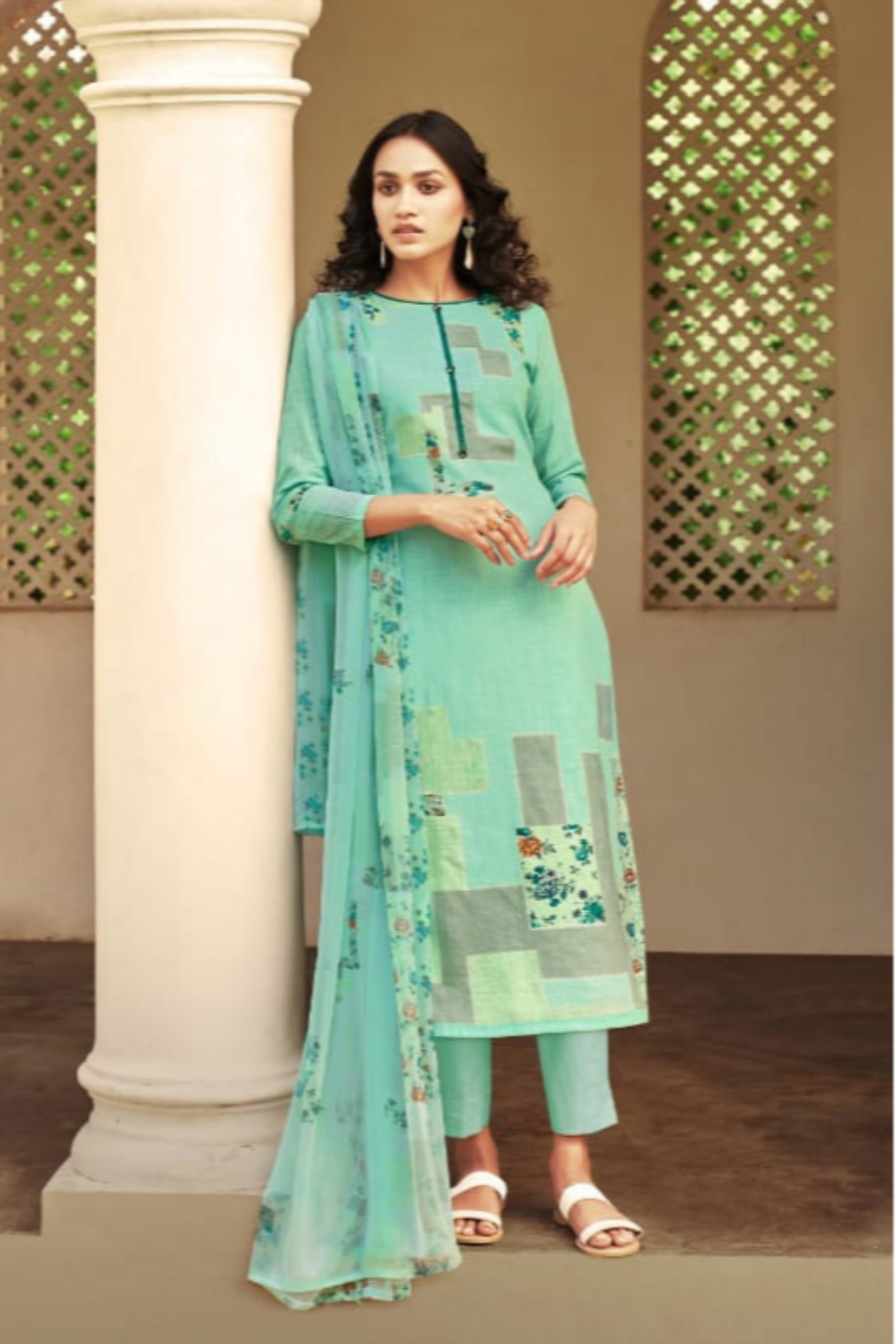 Green colour cotton wear symbolizes freshness and festivity – great for Mehndi or family gatherings. 