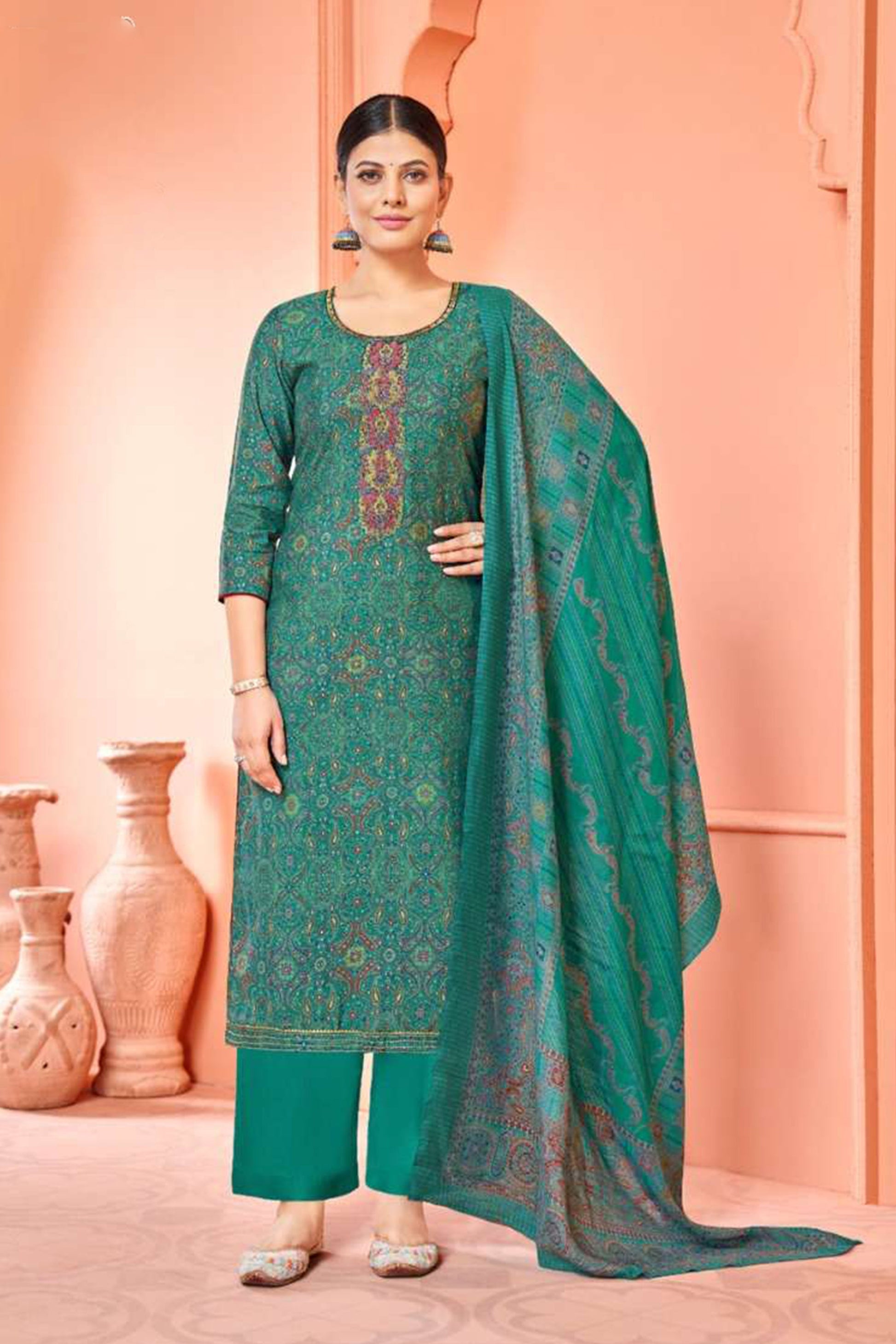 Green colour cotton wear symbolizes freshness and festivity – great for Mehndi or family gatherings. 