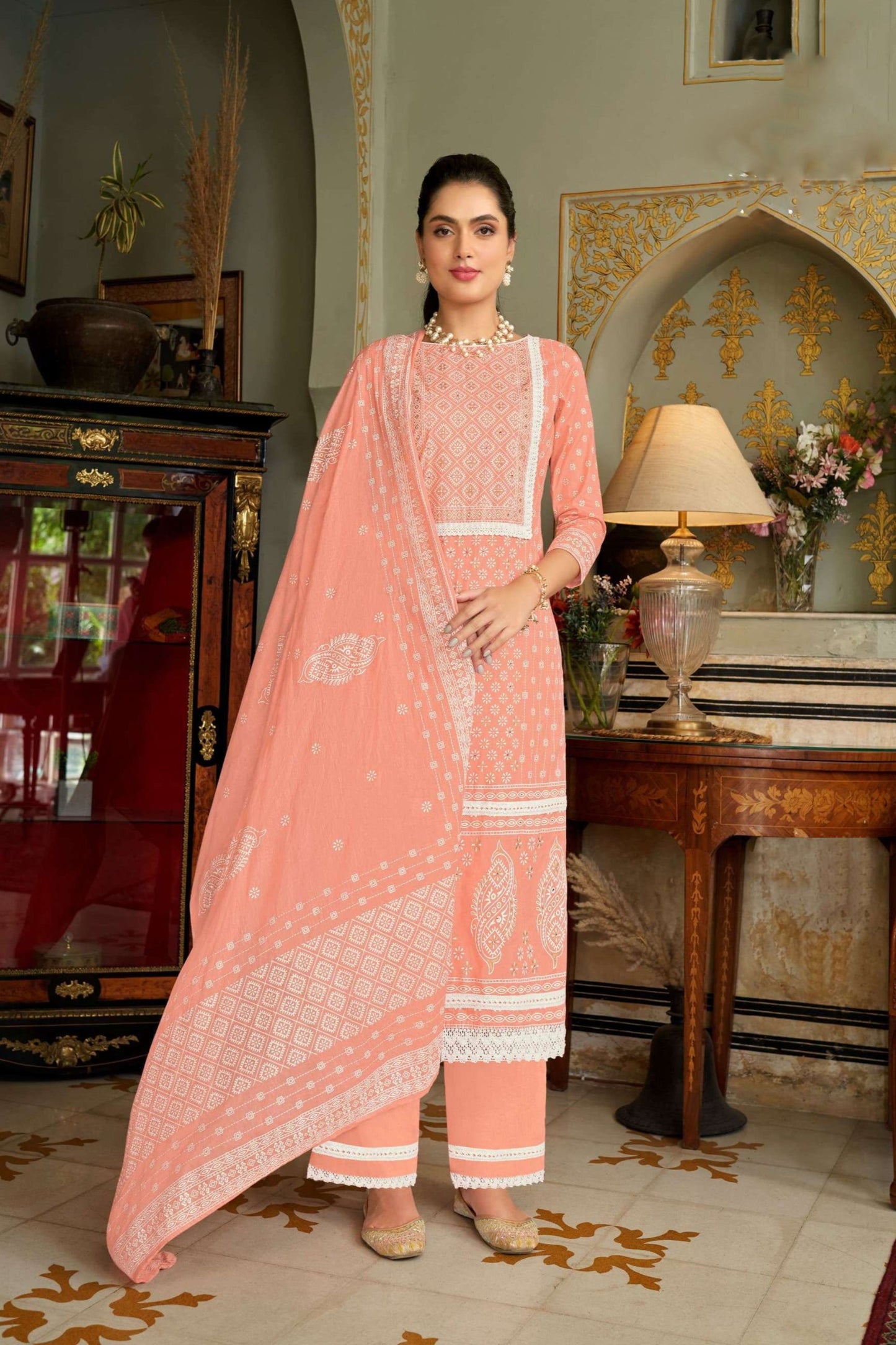 Orange colour cotton wear adds vibrance and energy – a bold choice for cultural celebrations. 