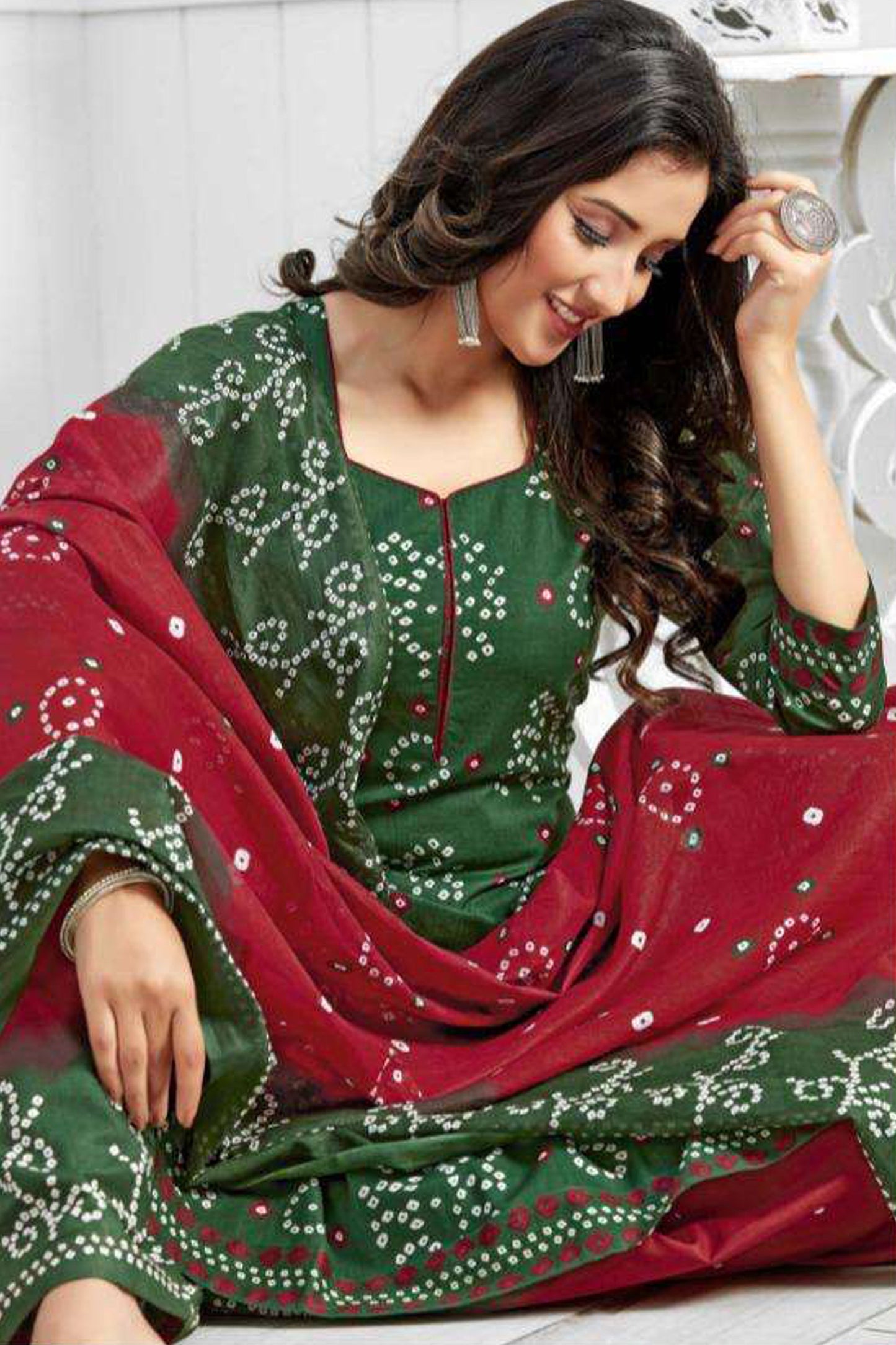 Green colour cotton wear symbolizes freshness and festivity – great for Mehndi or family gatherings. 