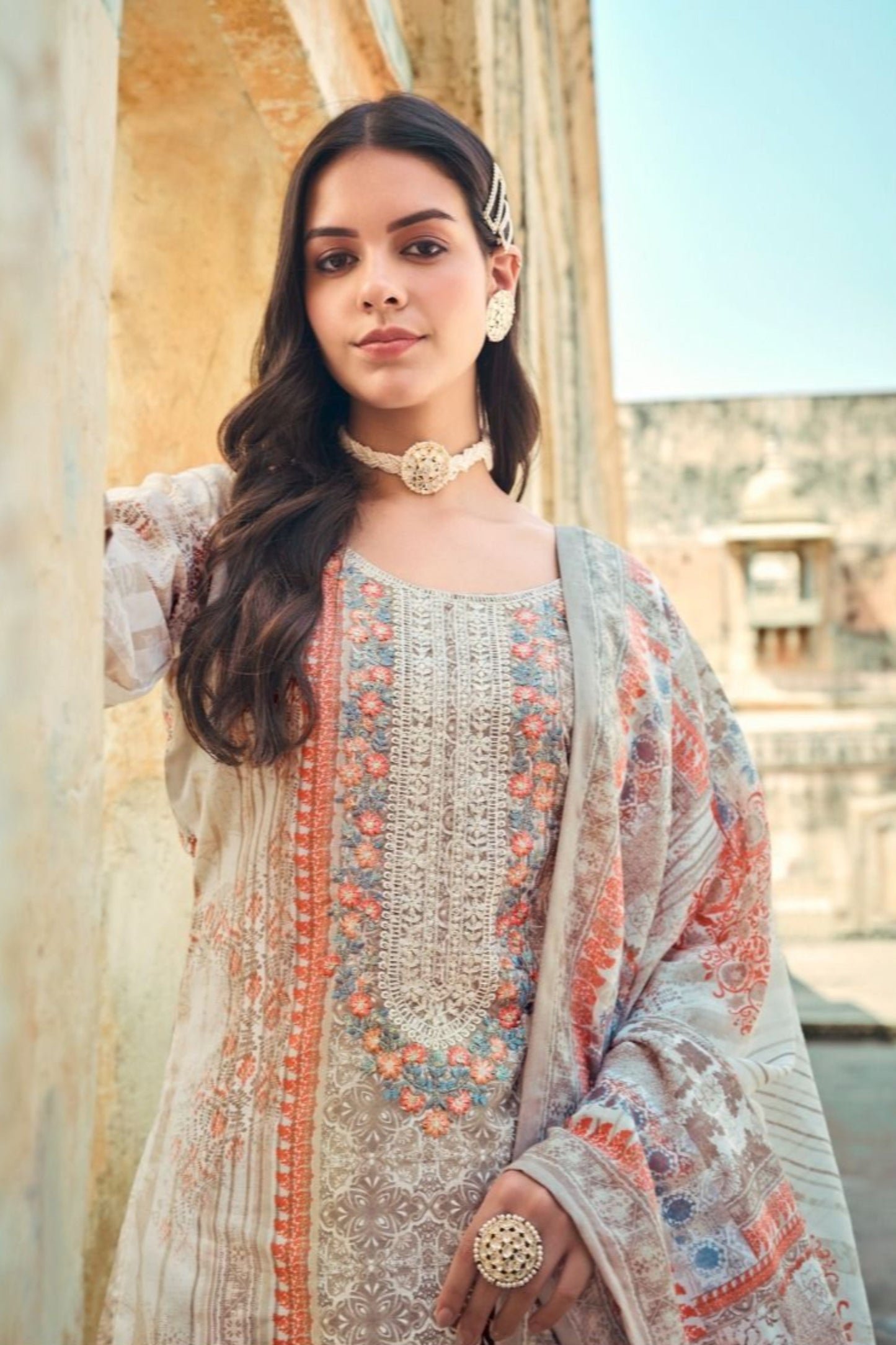 Light grey salwar kameez brings a subtle, sophisticated charm, ideal for minimalist style and graceful everyday wear.
