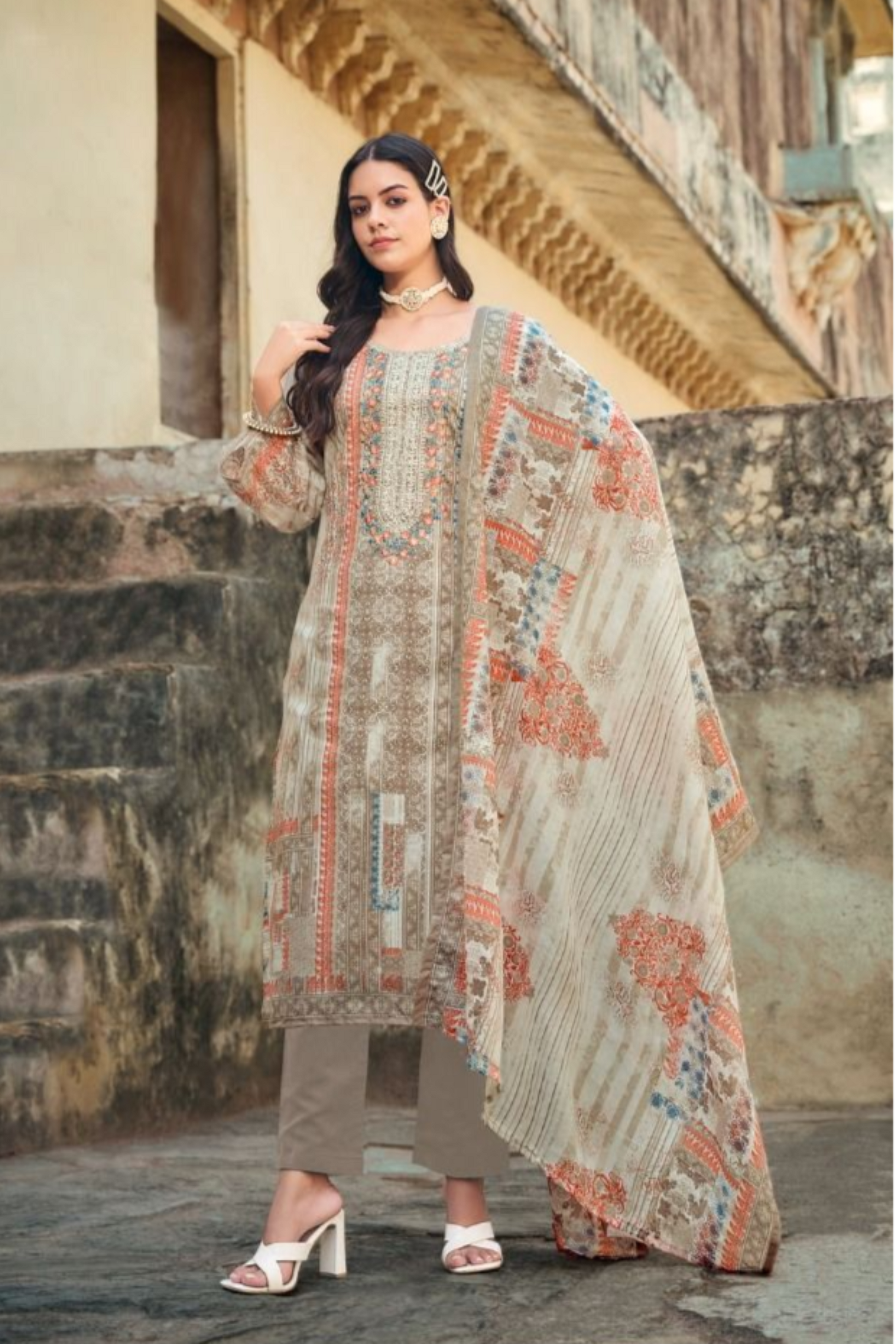 Light grey salwar kameez brings a subtle, sophisticated charm, ideal for minimalist style and graceful everyday wear.
