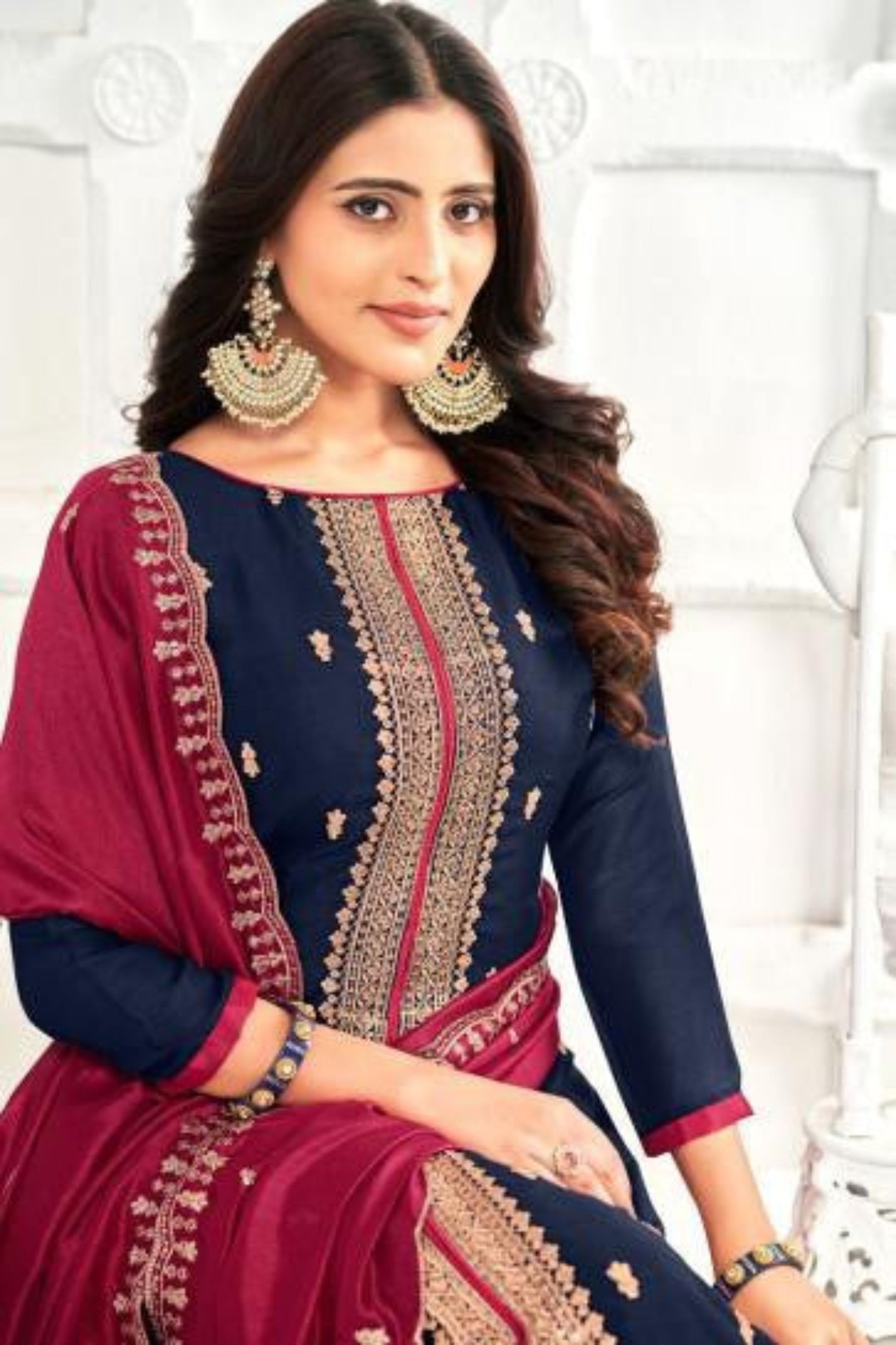 Dark blue cotton top and bottom paired with a vibrant red dupatta create a striking contrast, perfect for festive gatherings, family functions, and elegant everyday wear. 