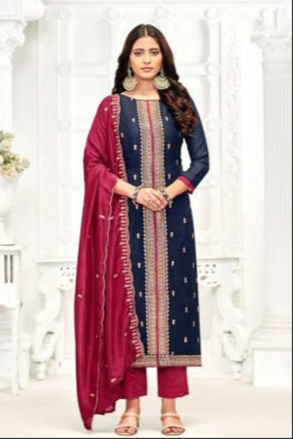 Dark blue cotton top and bottom paired with a vibrant red dupatta create a striking contrast, perfect for festive gatherings, family functions, and elegant everyday wear. 