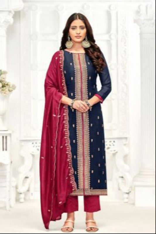Dark blue cotton top and bottom paired with a vibrant red dupatta create a striking contrast, perfect for festive gatherings, family functions, and elegant everyday wear. 