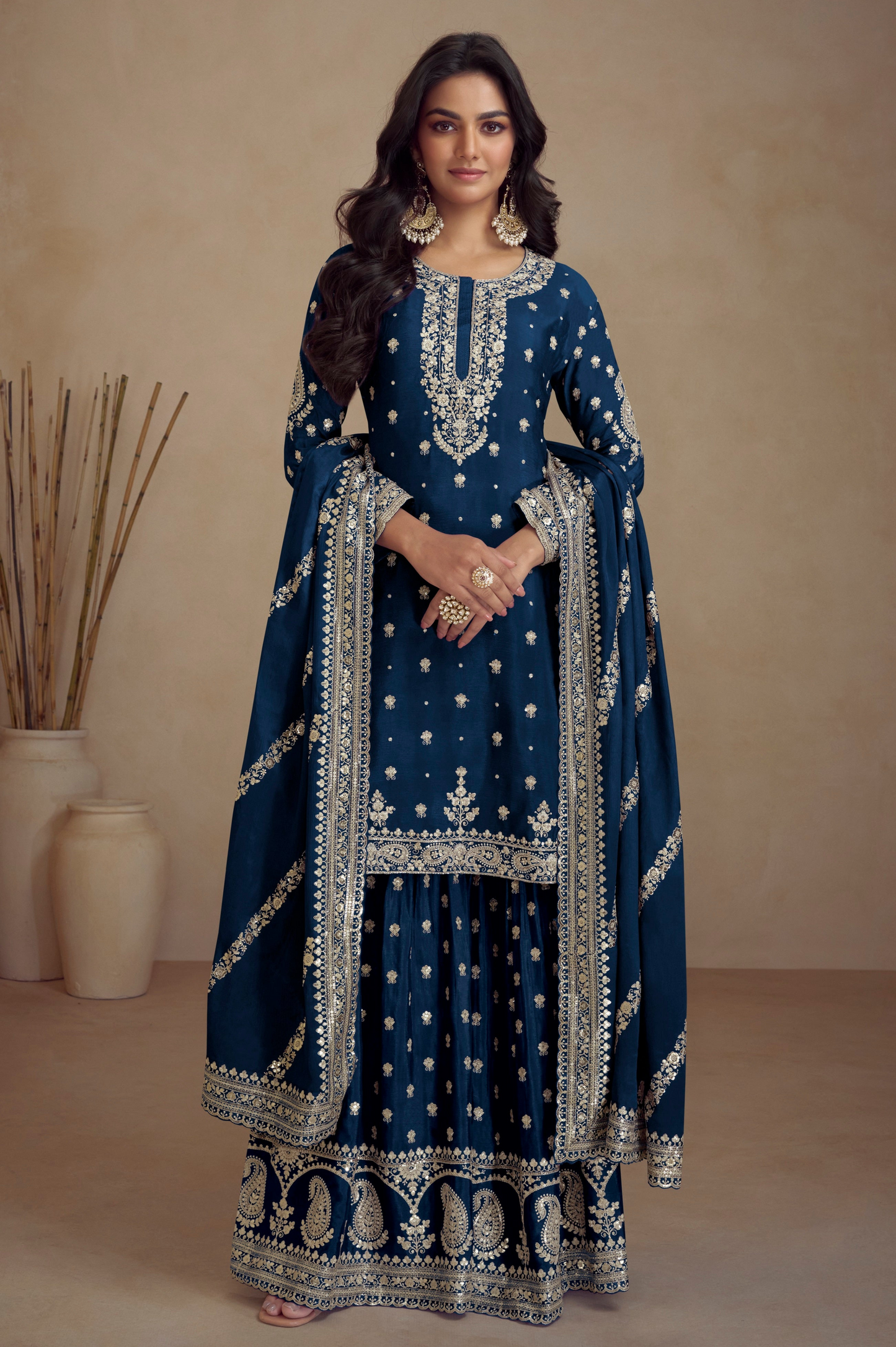 navy blue sharara dress with embroidered detailing 