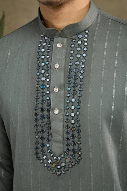 Detailed close-up of kurta pajama fabric and traditional ethnic accents