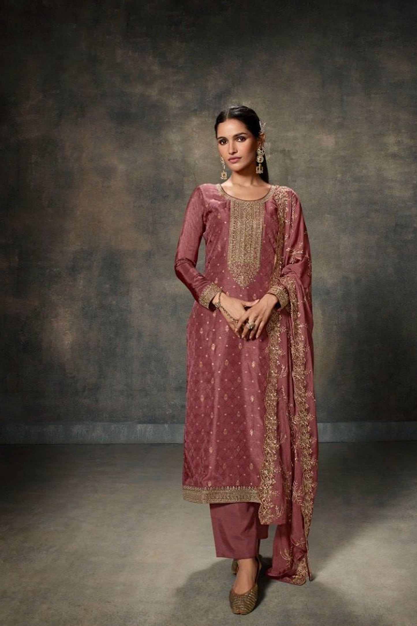 embroidered pink salwar suit close-up detailing
