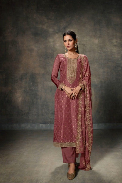 embroidered pink salwar suit close-up detailing
