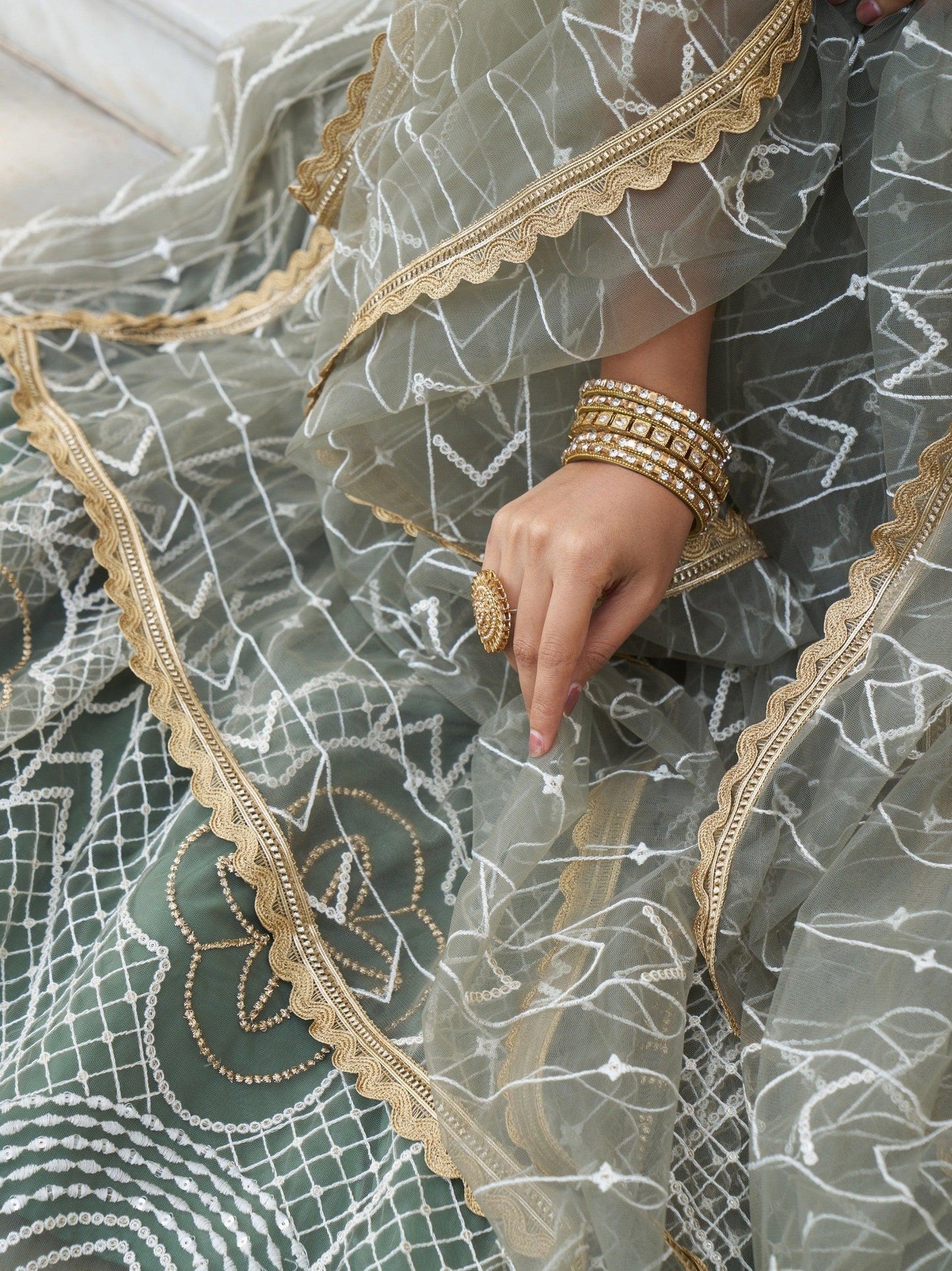 Wedding reception olive green lehenga with multi embroidery