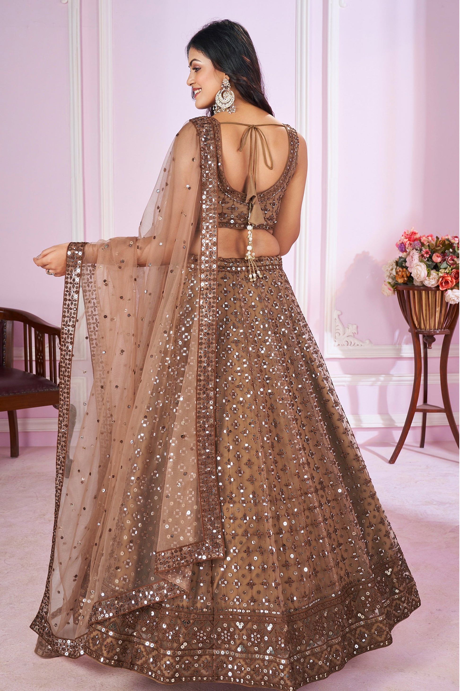 Experience bridal couture with lehengas that sparkle with intricate artistry. 