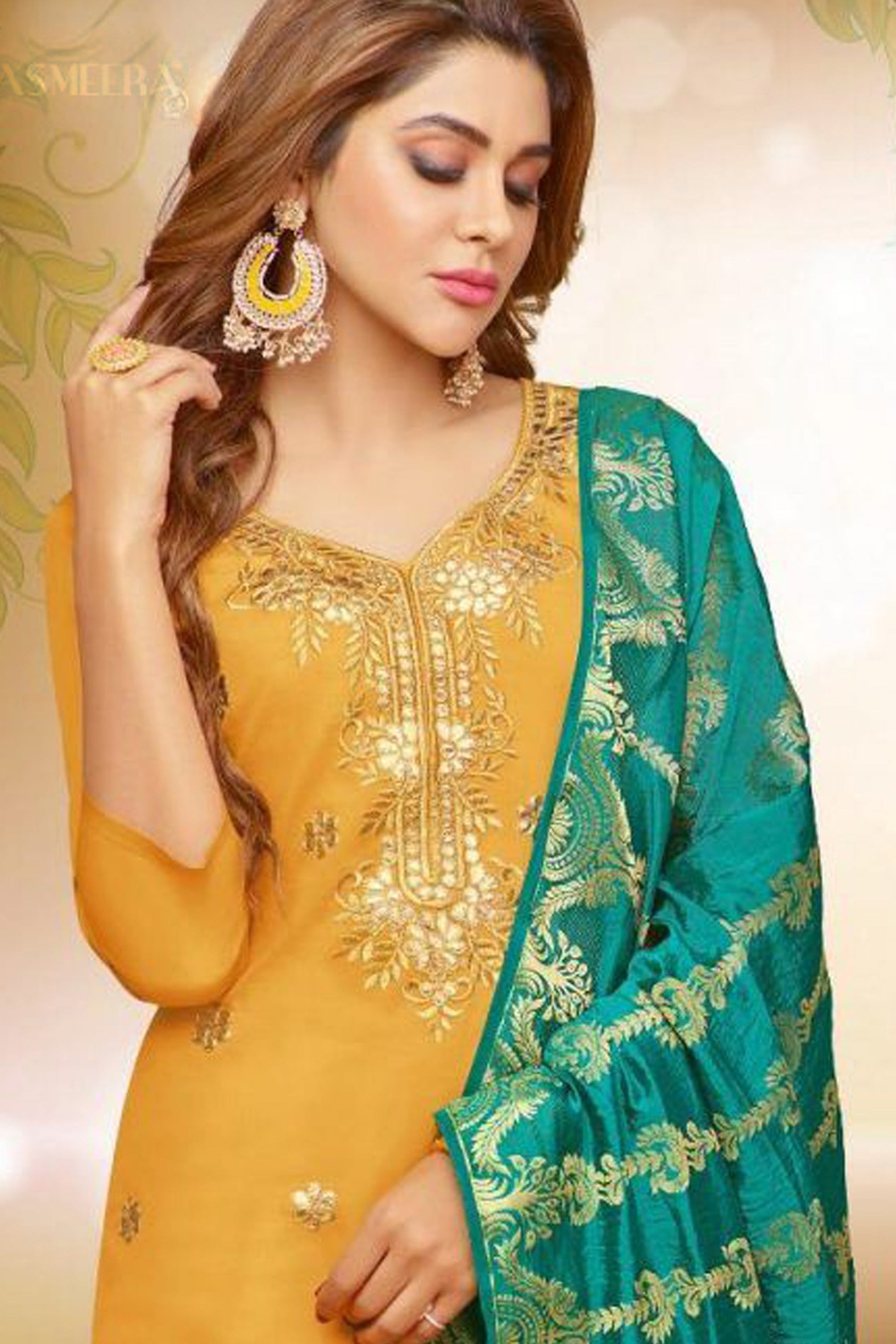 Close up of patiala yellow suit gota embroidery