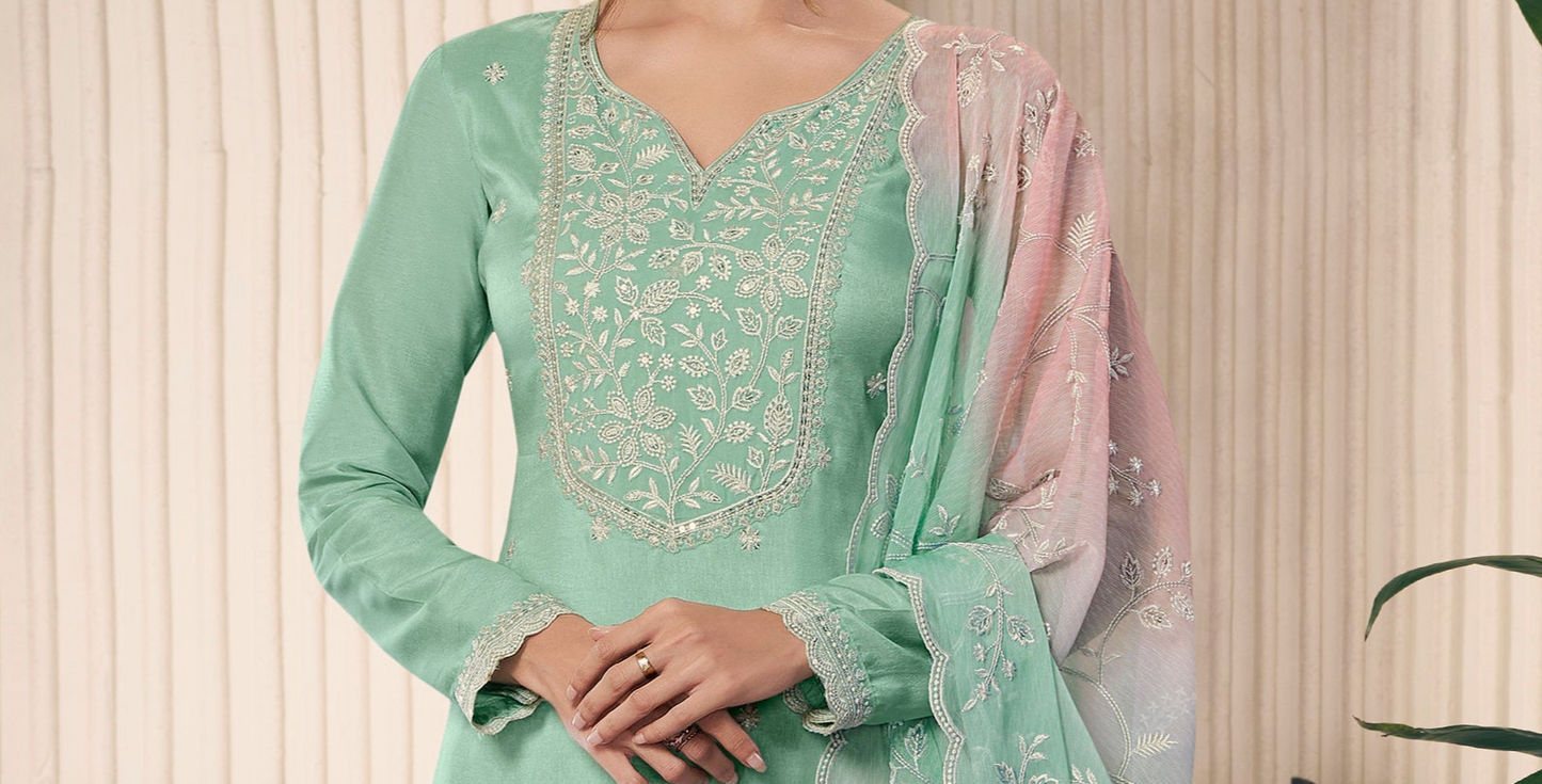 female salwar suit in light green for cultural occasions