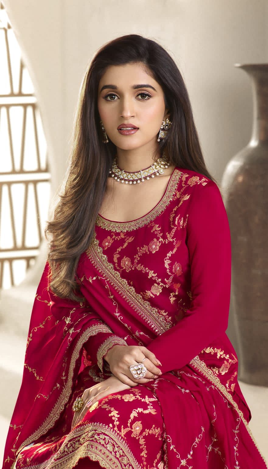 A Woman Wearing a Traditional Pakistani Salwar Kameez Dupatta Suit 