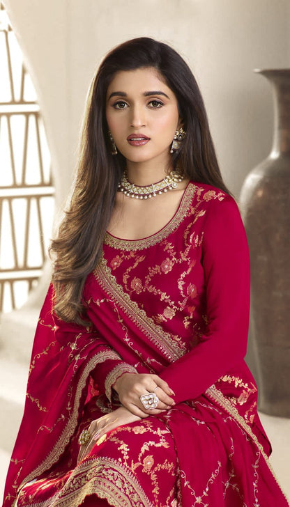A Woman Wearing a Traditional Pakistani Salwar Kameez Dupatta Suit 