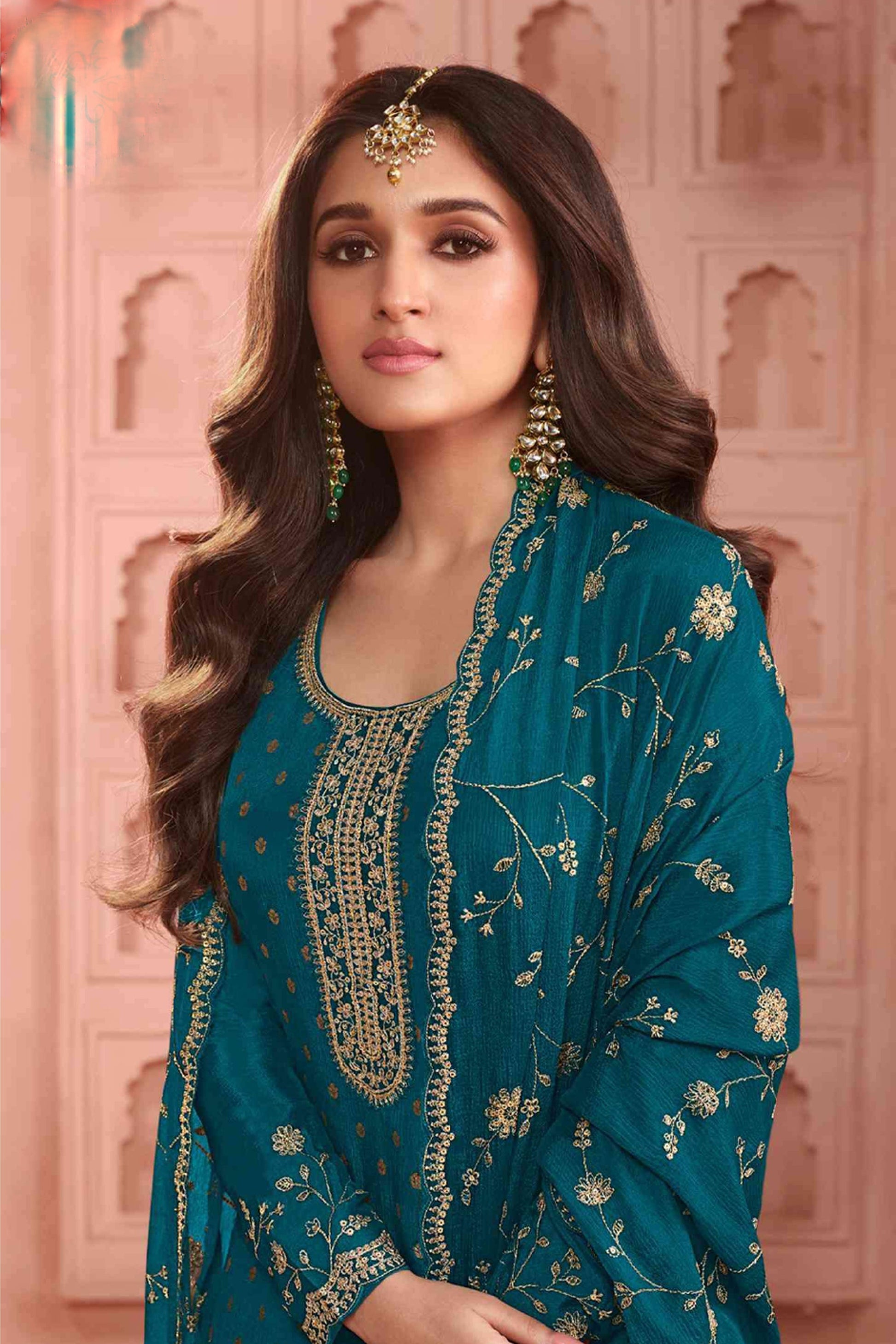 Indian wedding suit side angle showing embroidered pattern