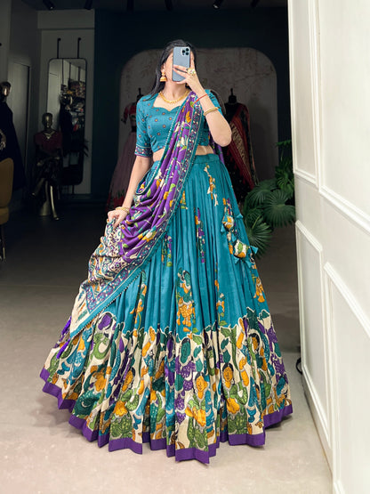 Blue Tussar silk lehenga with Kalamkari print work, featuring artistic patterns that add a graceful touch to festive wear.
