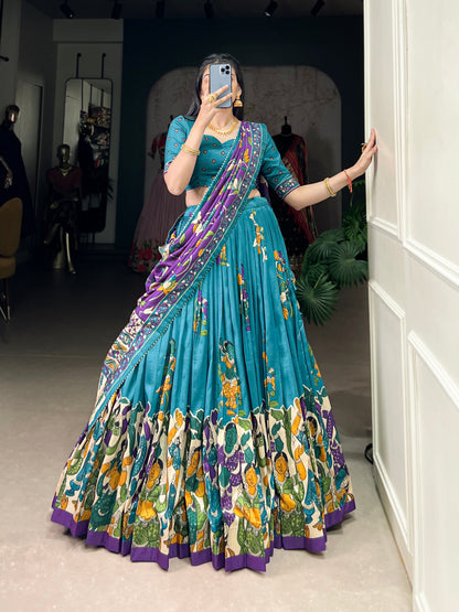 Blue Tussar silk lehenga with Kalamkari print work, featuring artistic patterns that add a graceful touch to festive wear.

