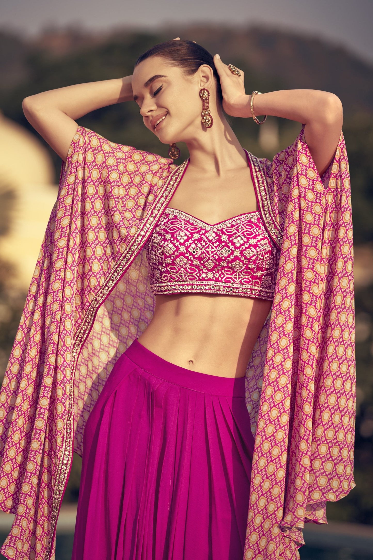 Pink color lehenga in Chinon silk fabric, featuring a soft flowy texture and elegant finish, perfect for festive and wedding occasions. 