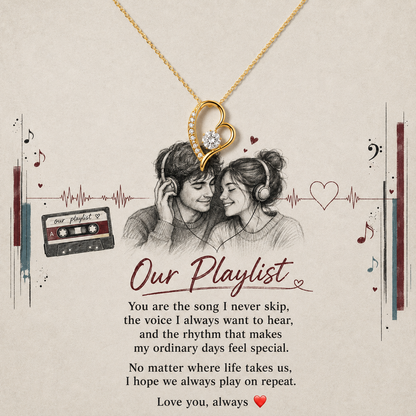 A gold heart-shaped pendant necklace with a small clear stone is displayed on a beige card that reads 'Our Playlist' with a romantic quote, a sketch of a couple wearing headphones, and music-themed illustrations.