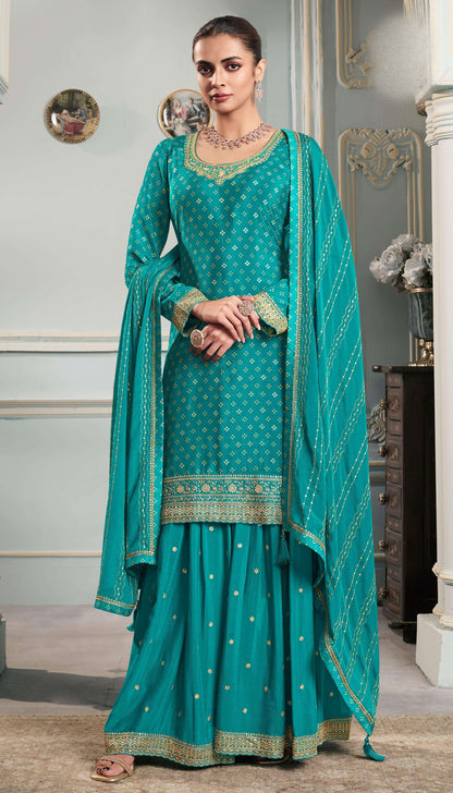Detailed Embroidery Work On Teal Sharara Outfit