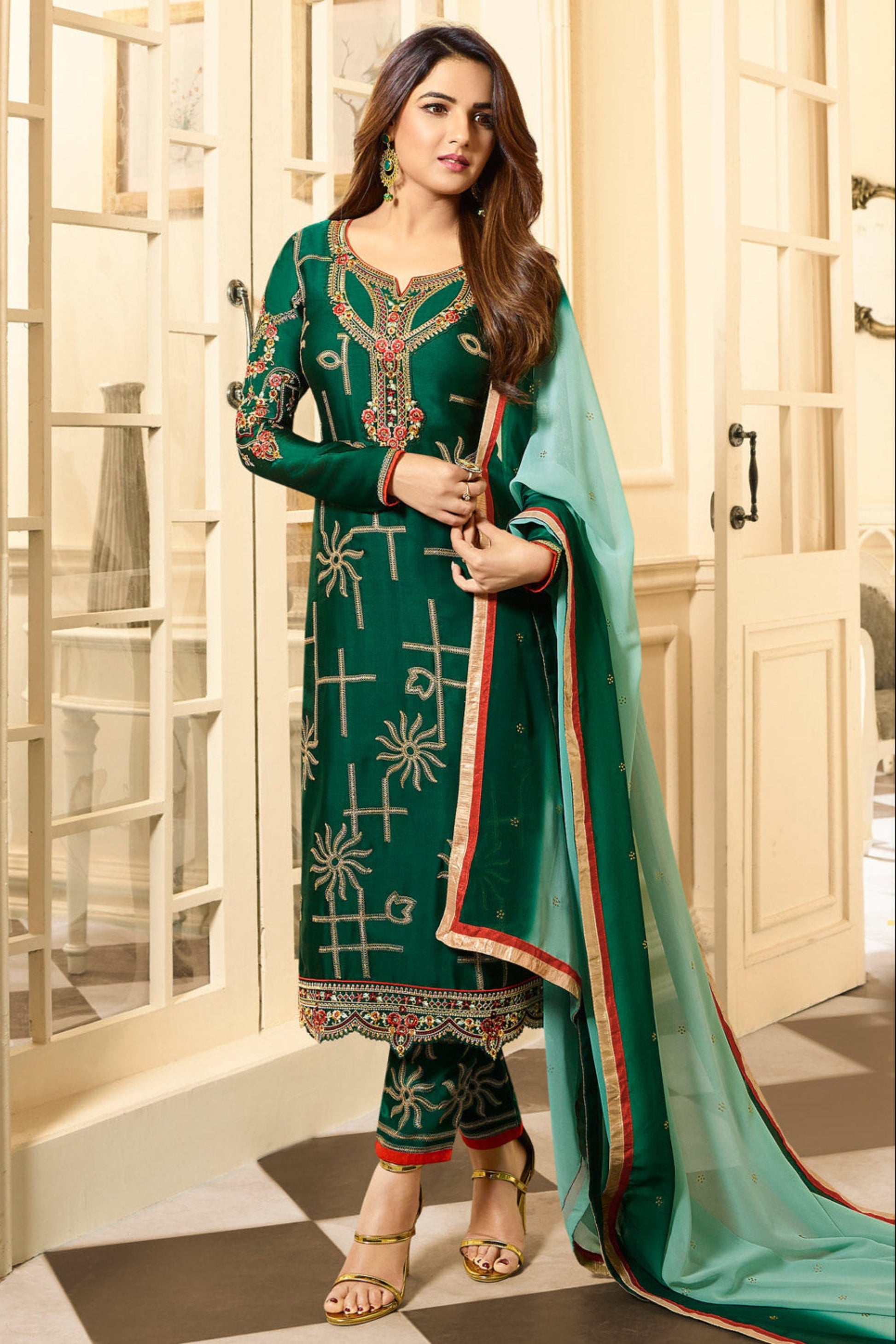 Dark green salwaar kameez front view with embroidery