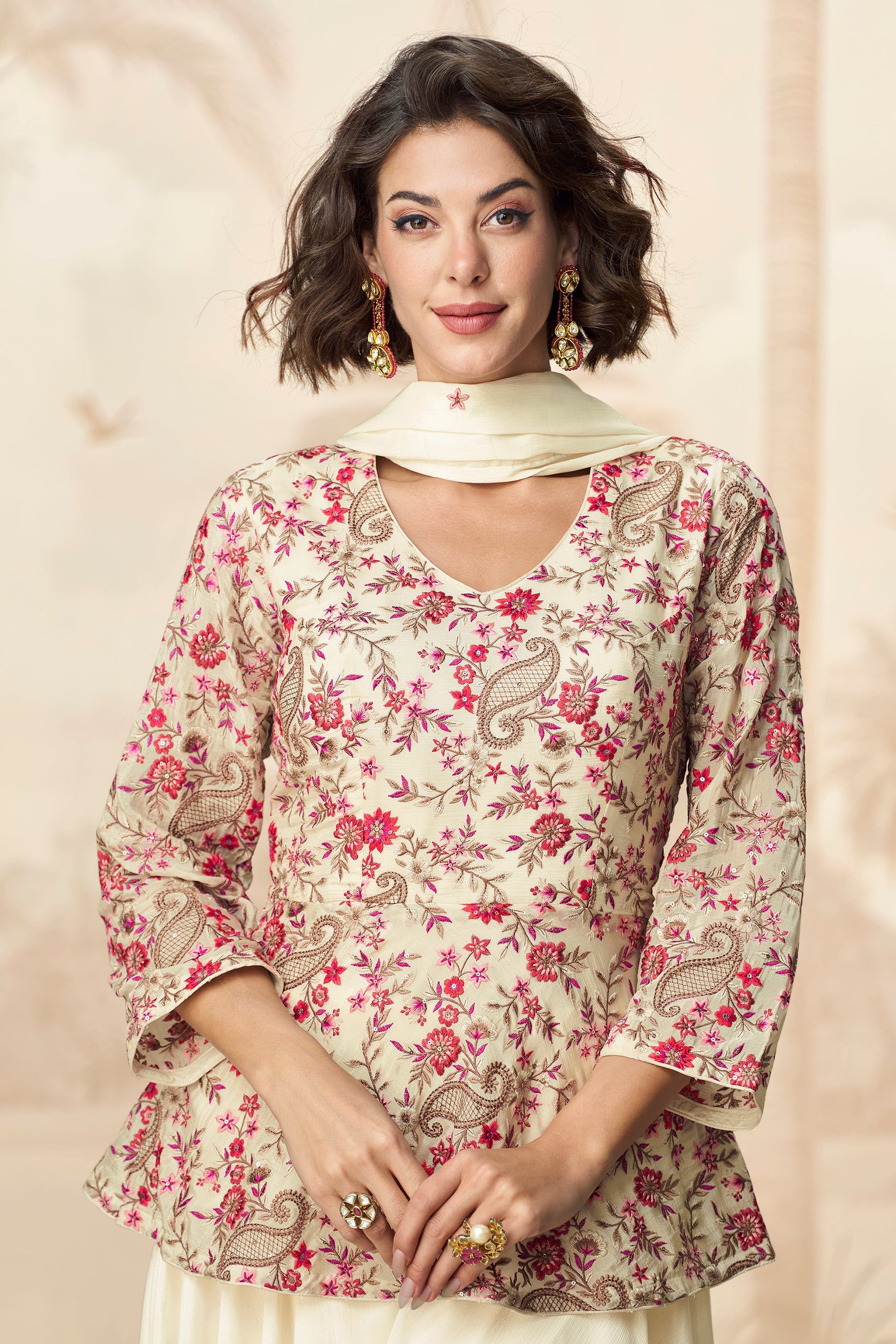 Elegant white palazzo set with soft fabric and simple design, perfect for casual wear or festive gatherings.
