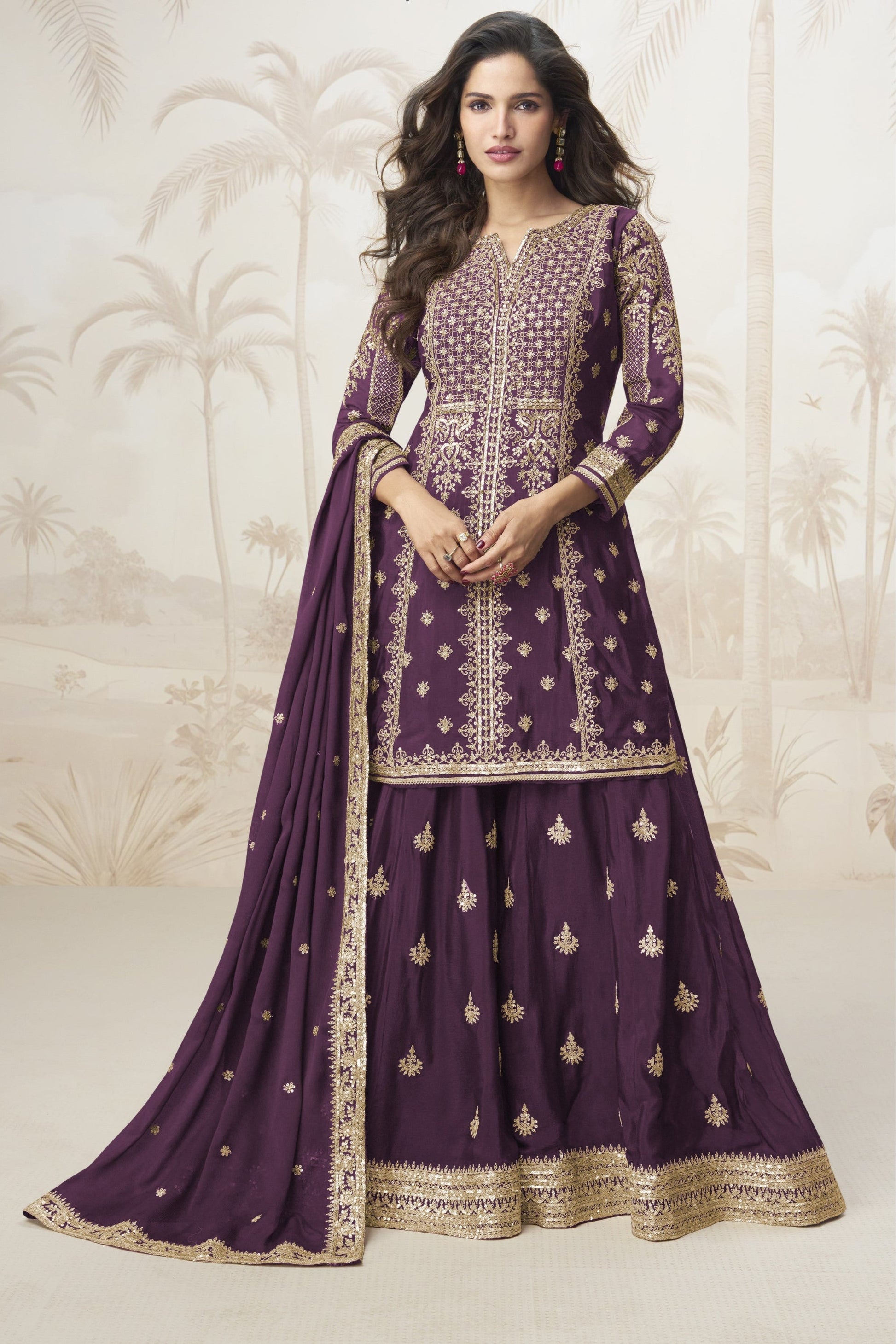 Purple color palazzo suit with embroidery work, exuding rich elegance and timeless charm, perfect for festive celebrations and special occasions. 