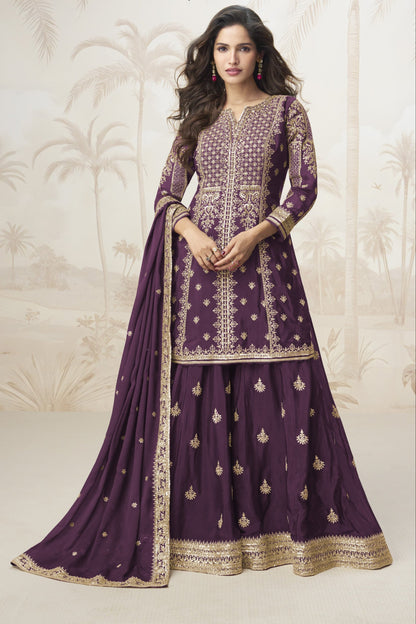 Purple color palazzo suit with embroidery work, exuding rich elegance and timeless charm, perfect for festive celebrations and special occasions. 