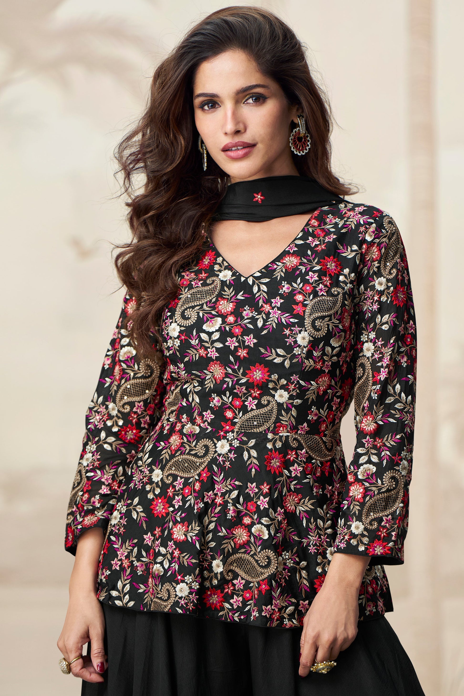 Classic black palazzo outfit with a perfect for evening events and festive occasions.
