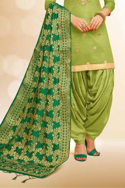 Green patiala suit styled for festive occasions