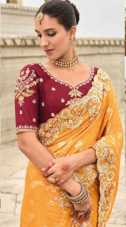 Orange Saree radiates warmth and vibrance – perfect for traditional functions and cultural flair. 