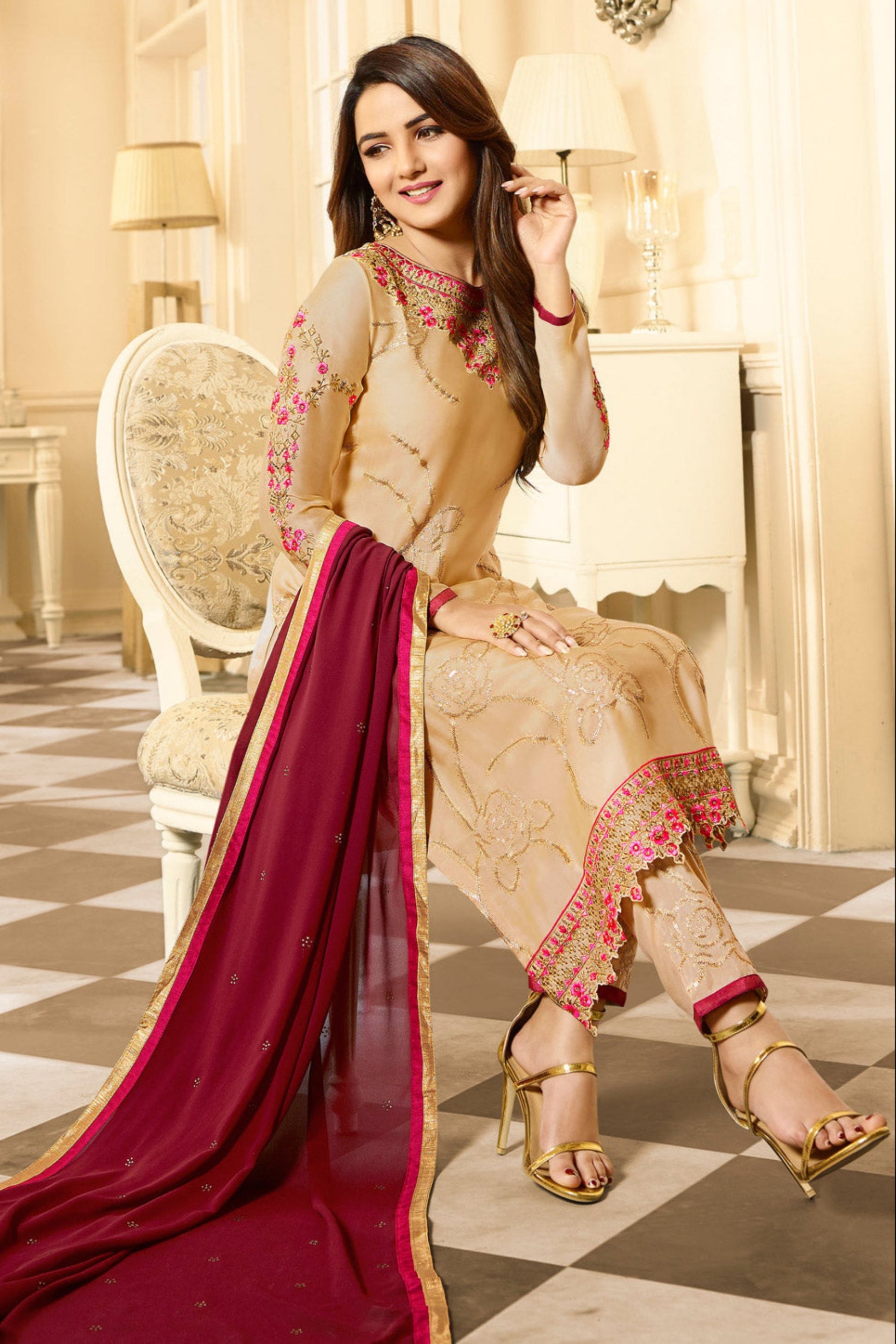 Close-up of satin georgette fabric texture in beige salwar kameez