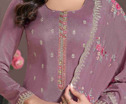 close-up of embroidery work on silk kameez