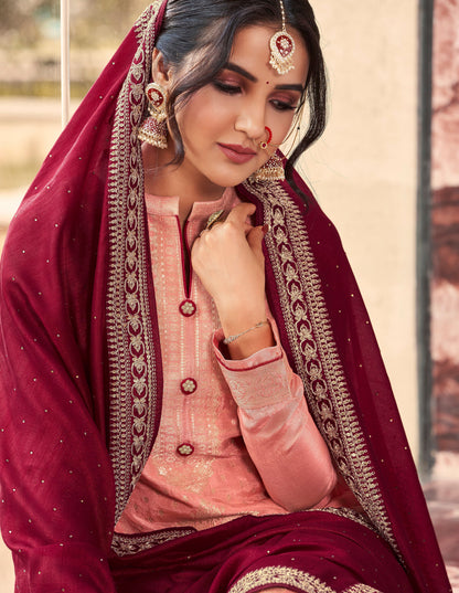 Peach salwar kameez brings soft elegance and warmth, perfect for daytime celebrations and festive charm.