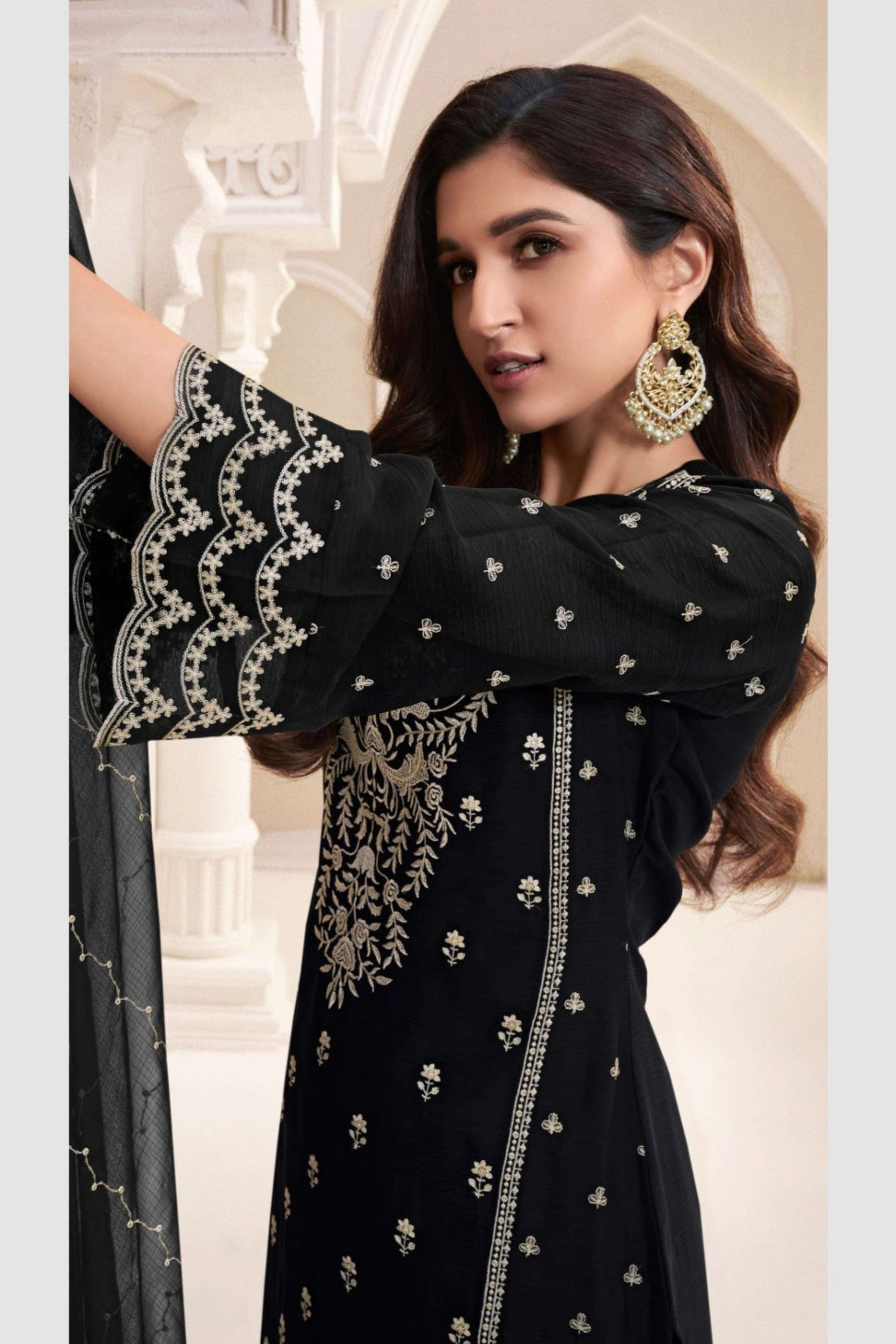 Close-up of embroidered detailing on black salwar kameez