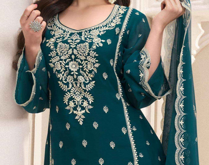 chinon fabric drape detail in green suit