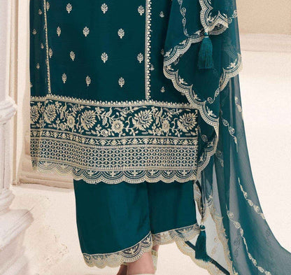 green suit styled for evening occasion