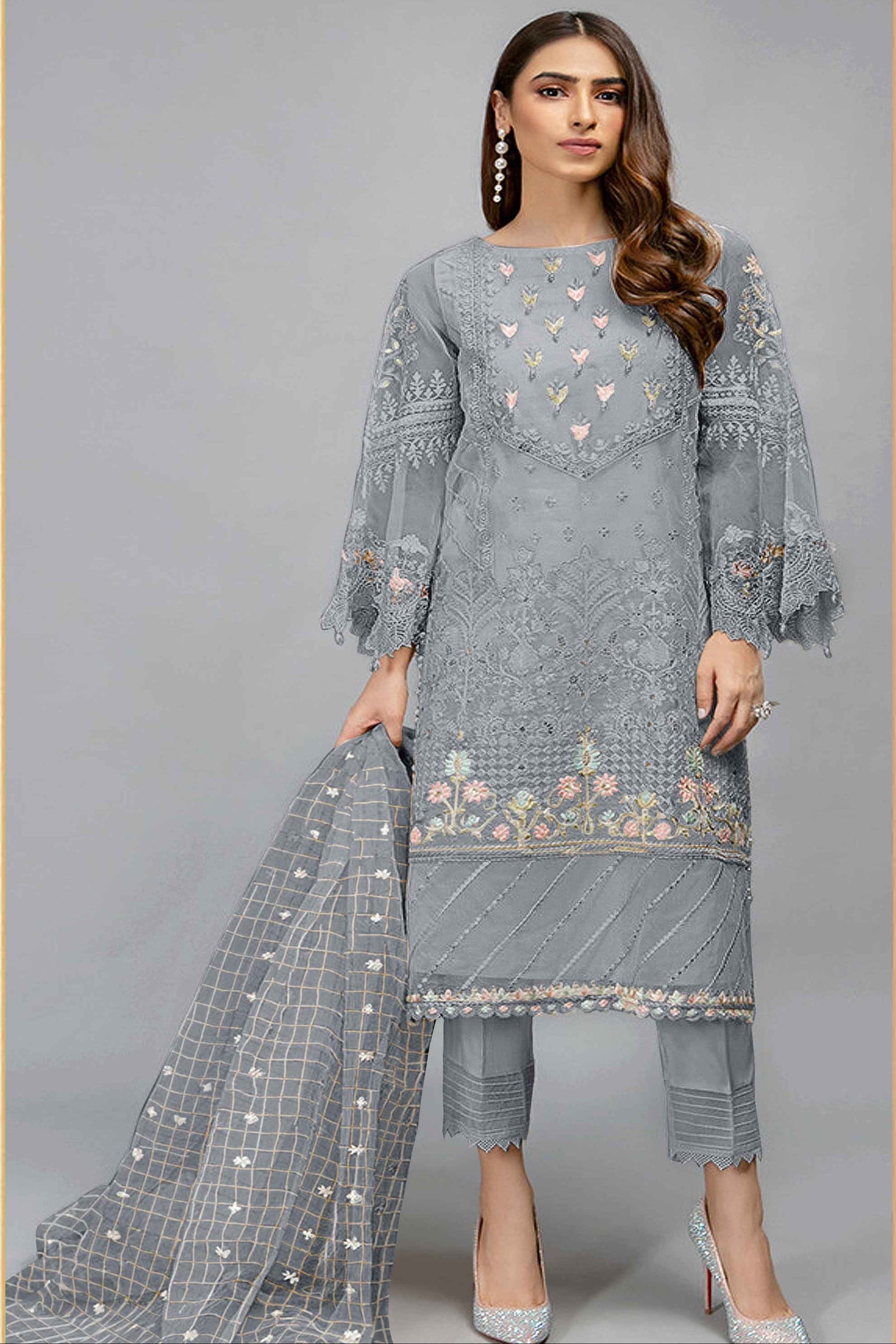 Grey salwar kameez looks simple and stylish. Metallic accents make it modern. 