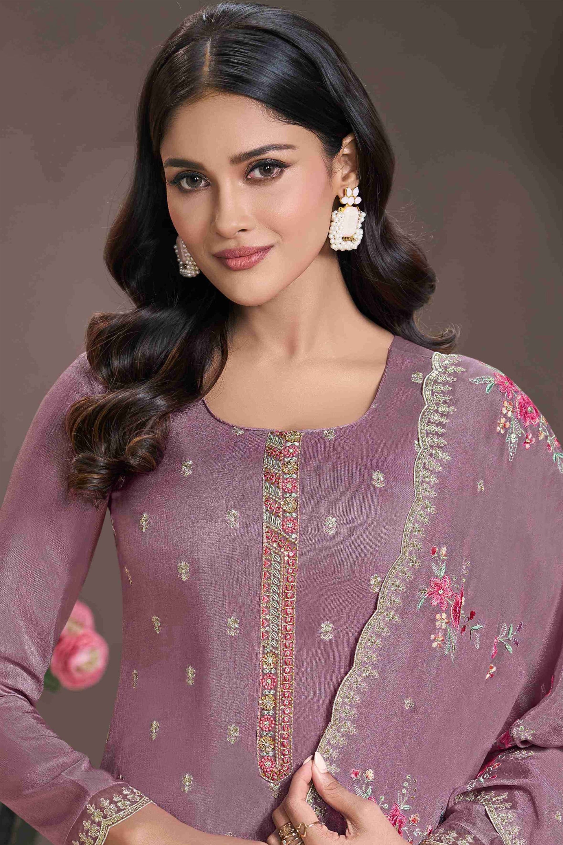 embroidered salwar kameez set shown from side angle